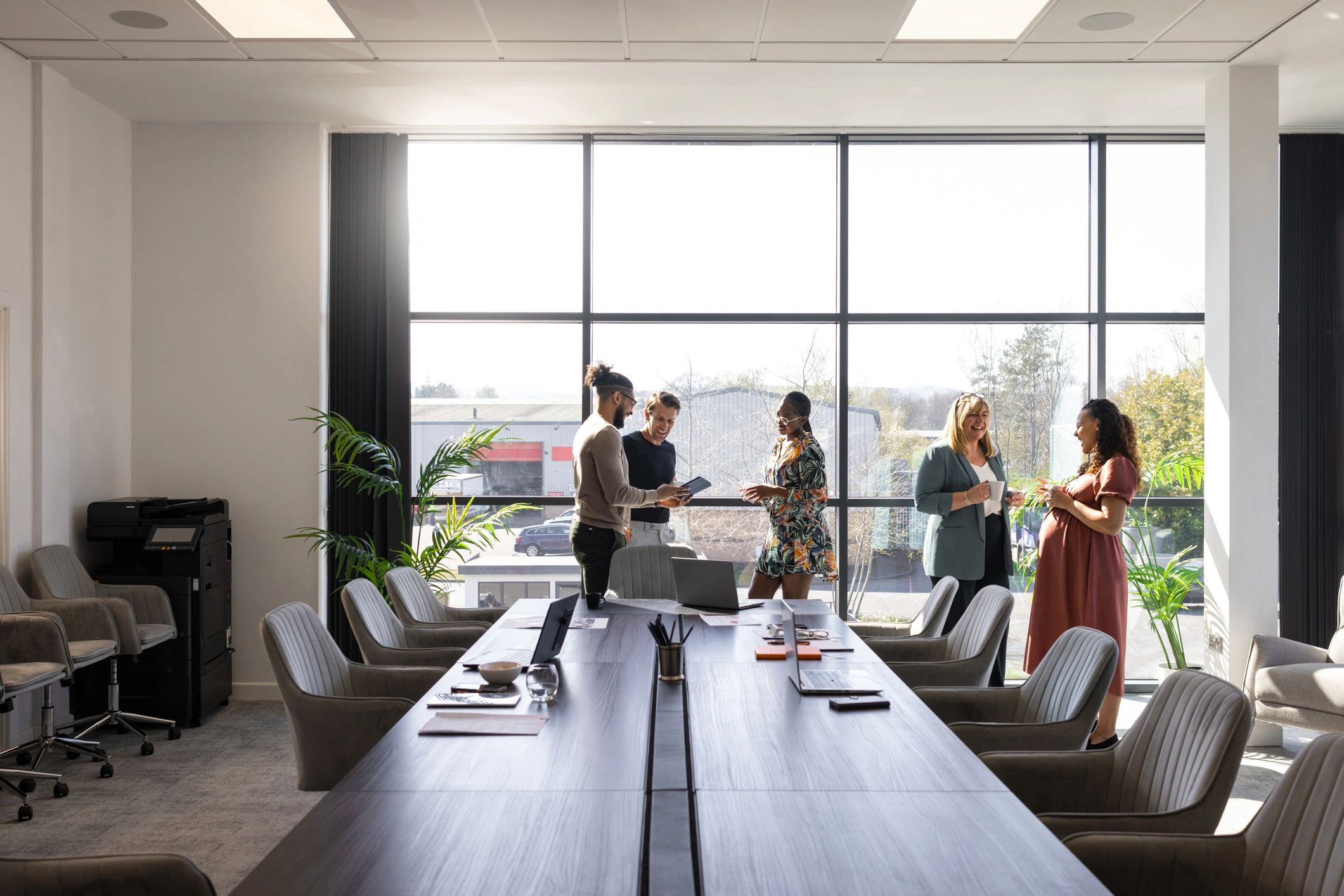Business team in a modern office discussing SEO strategy